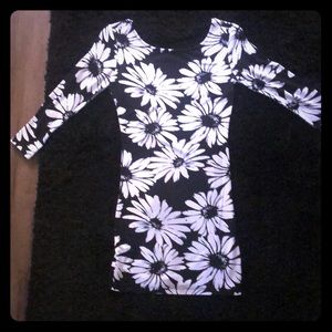 Form fitting black and white sunflower dress.